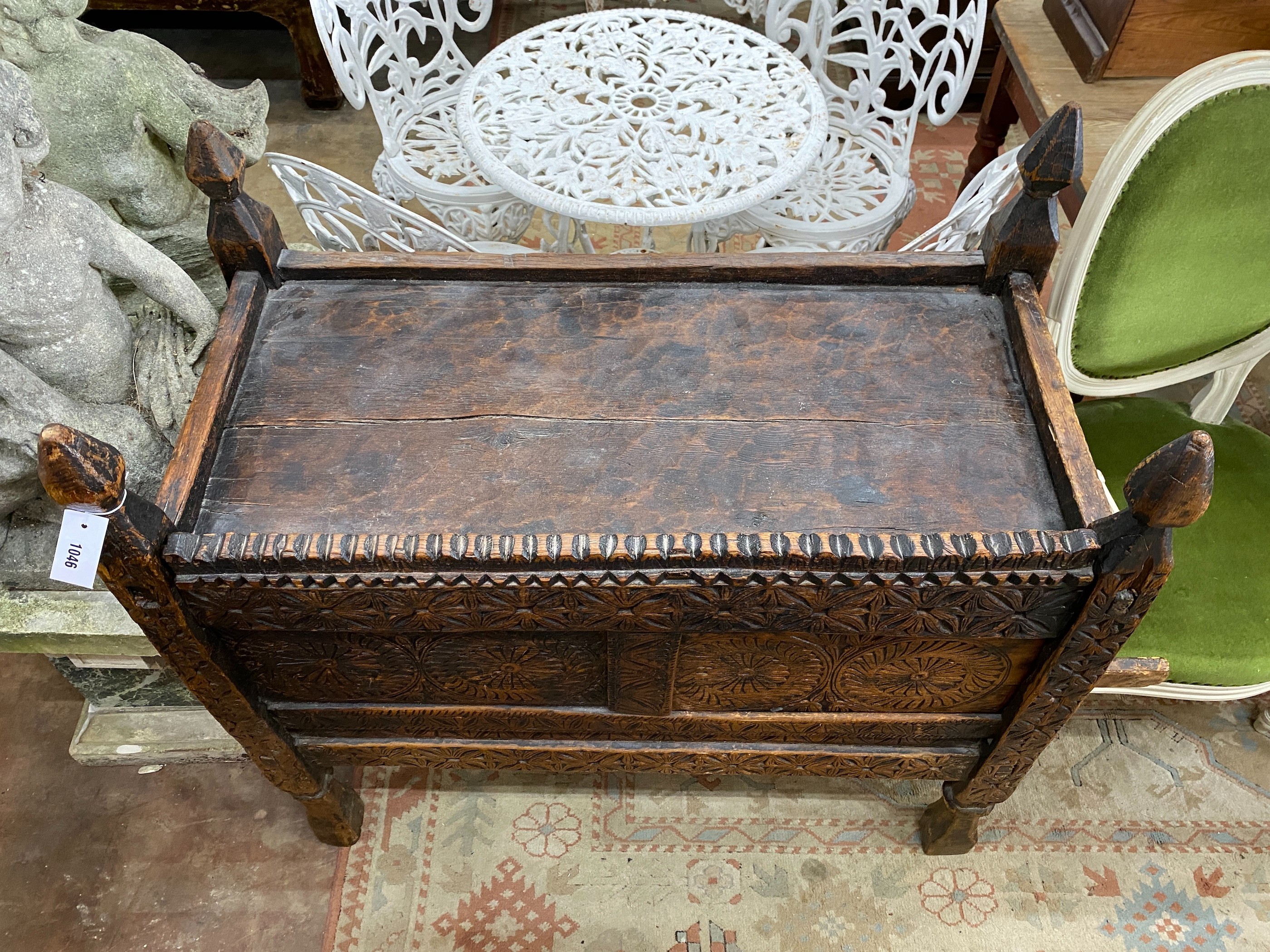 An Afghan chip carved hardwood chest, width 101cm, depth 52cm, height 100cm